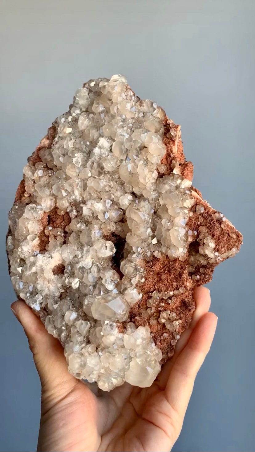 Lustrous Calcite with dark purple fluorite