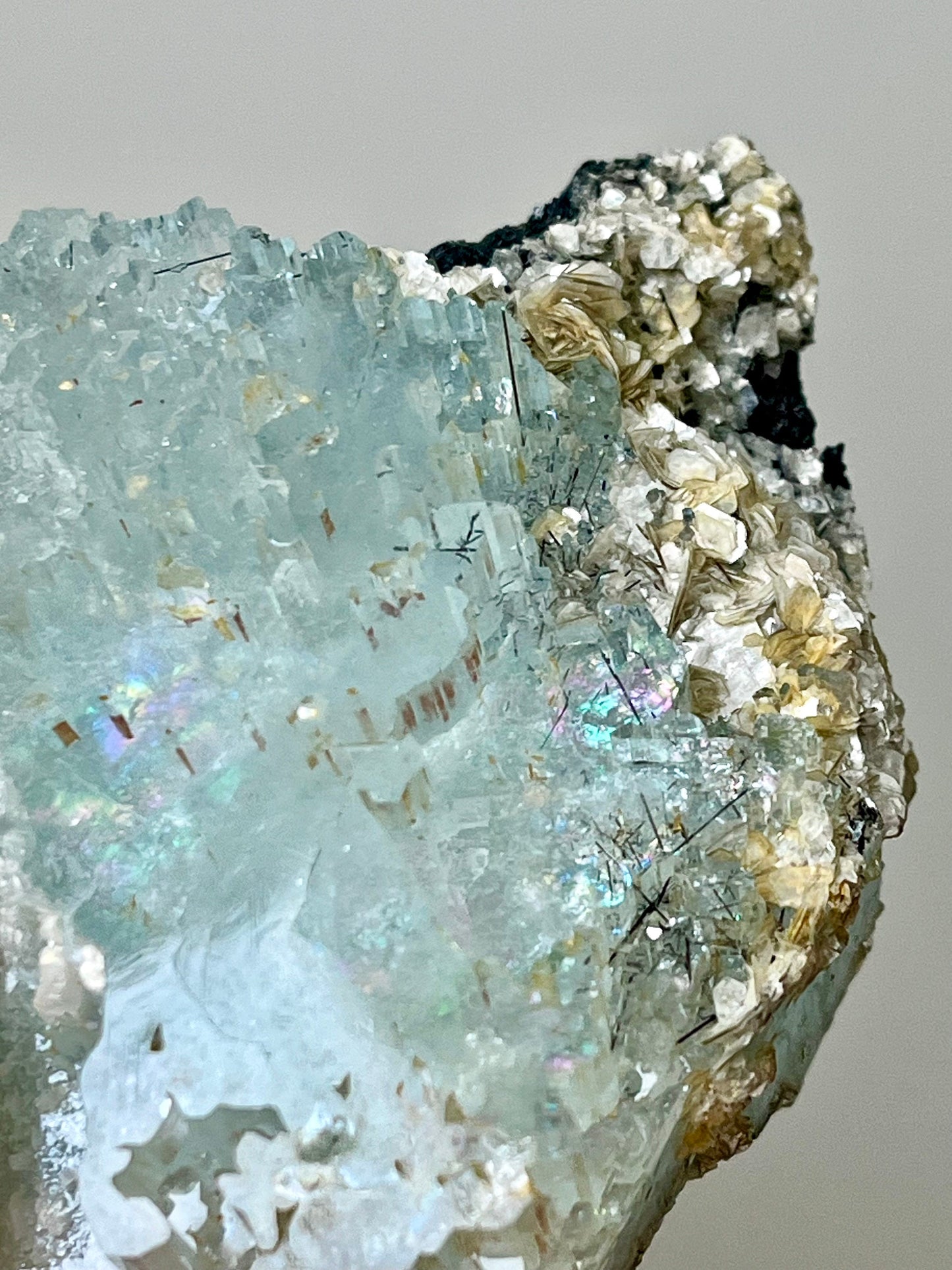 Aquamarine with Tourmaline & Iron Inclusions, Micas, Rainbows