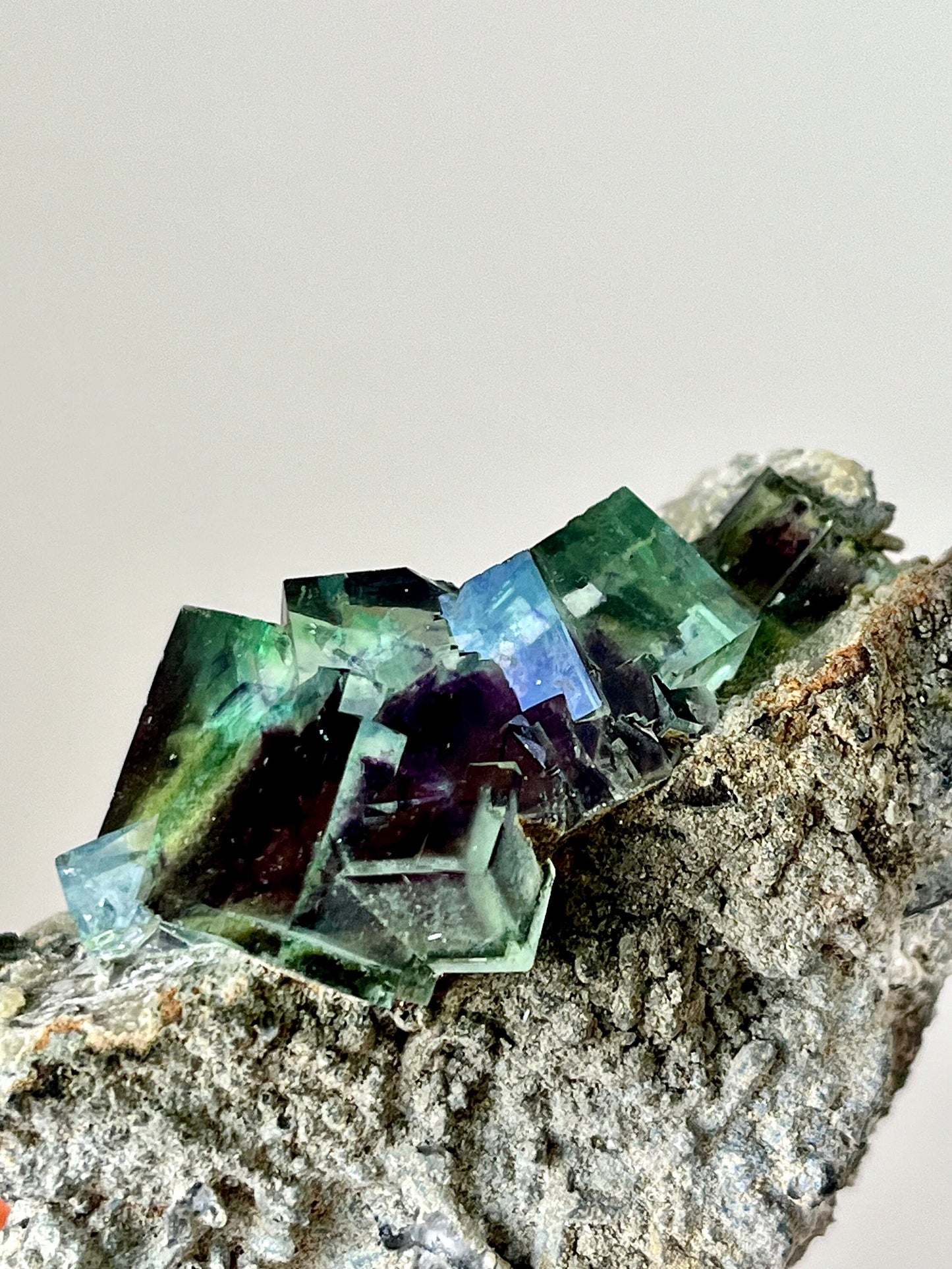Colour-zoned Fluorite with Quartz on matrix