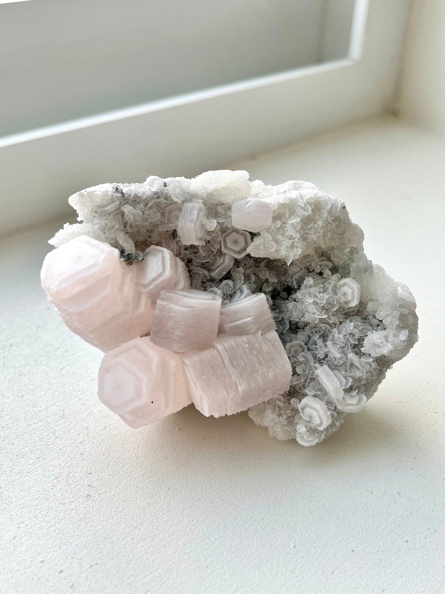 Fluorescent Pink Coin Calcite