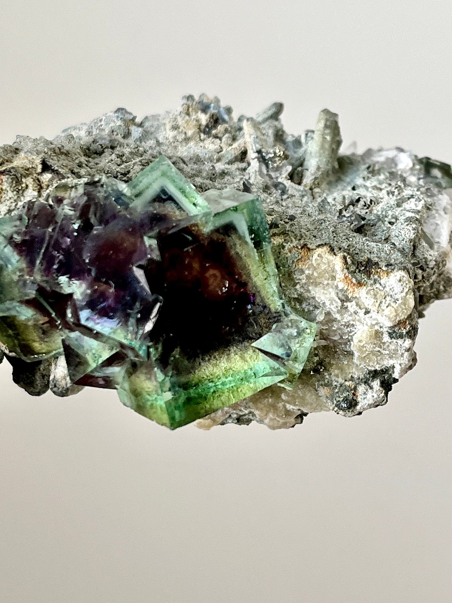 Colour-zoned Fluorite with Quartz on matrix