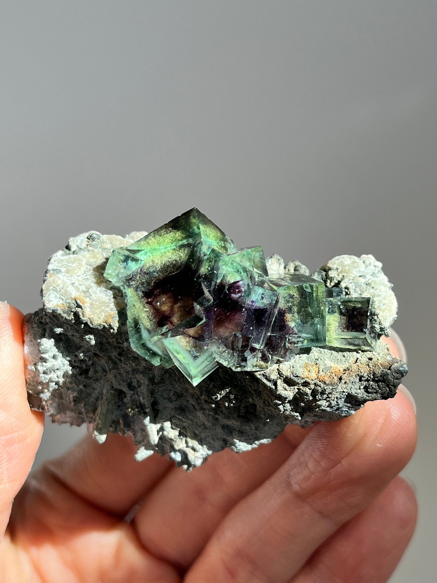 Colour-zoned Fluorite with Quartz on matrix