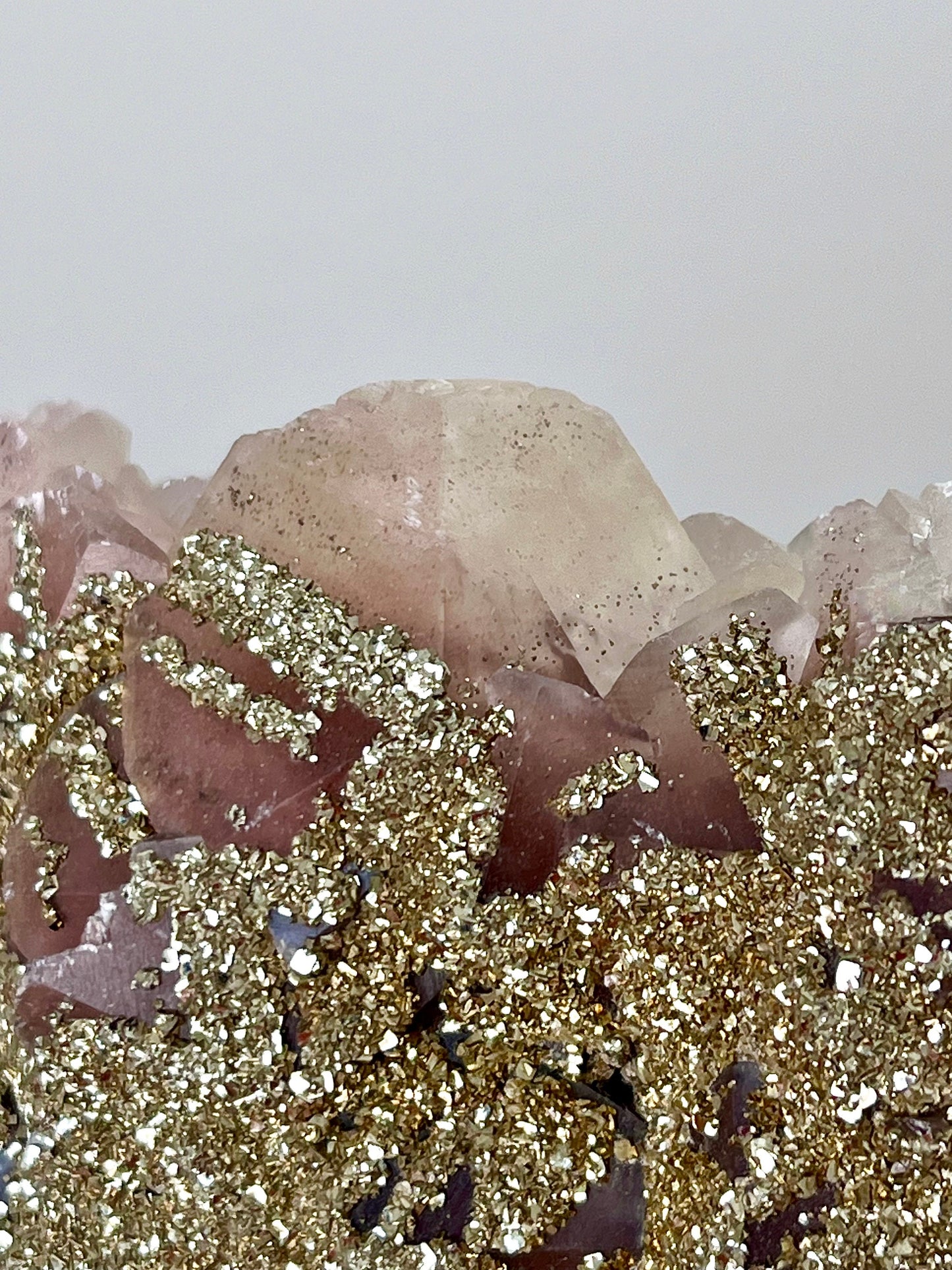 Fluorescent Pyrite-coated Calcite