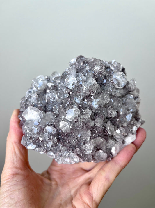 High Grade Fluorescent Diamond Calcite on Pinkish Matrix