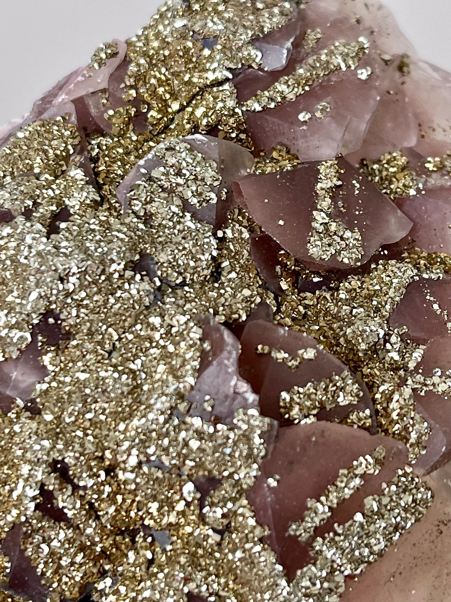 Fluorescent Pyrite-coated Calcite