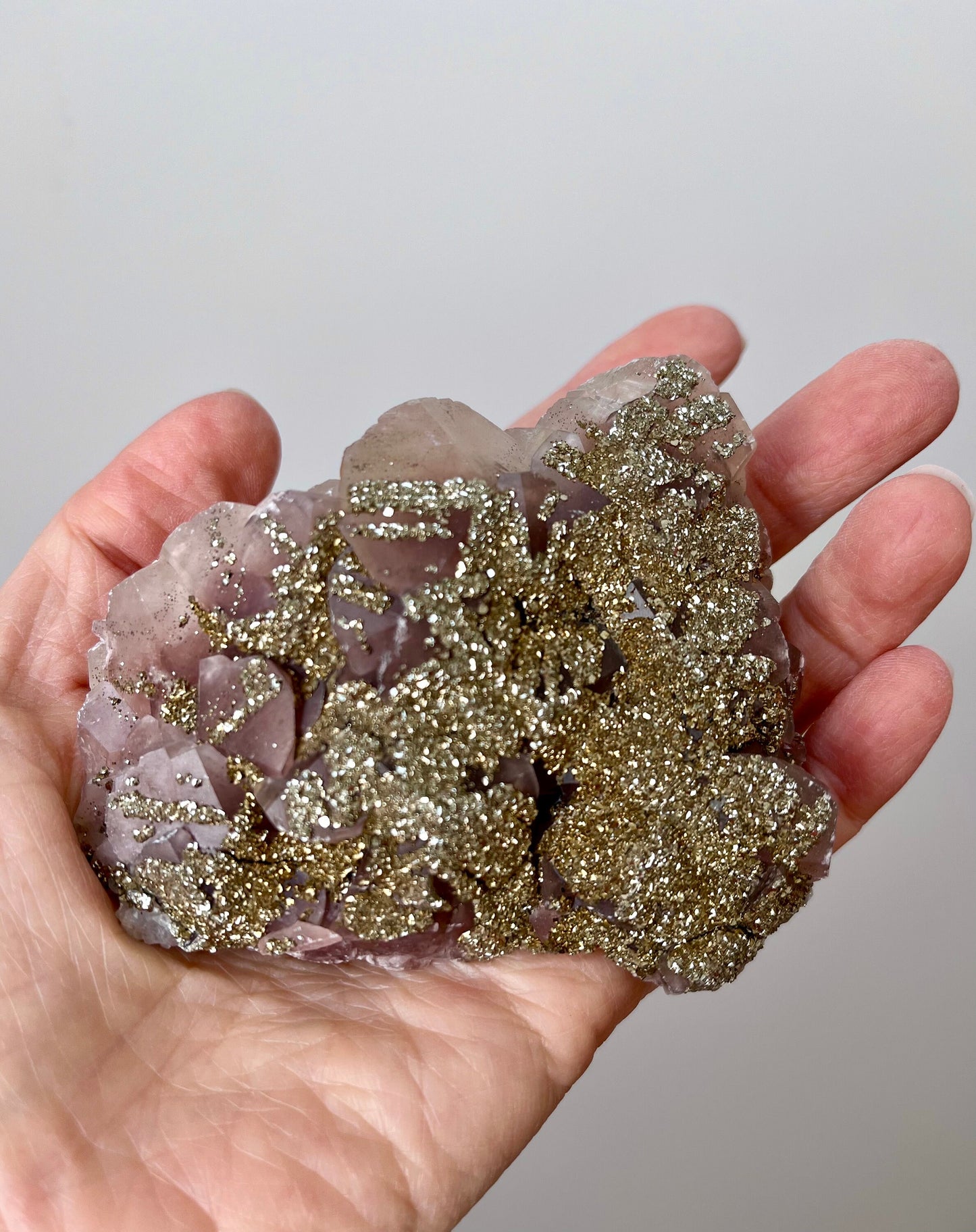 Fluorescent Pyrite-coated Calcite