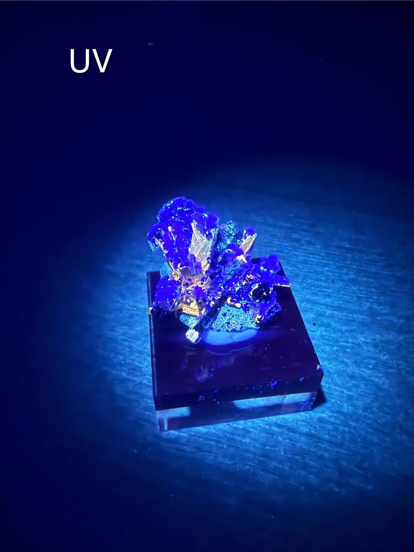 Fluorescent Fluorite-coated Stibnite & Valentinite