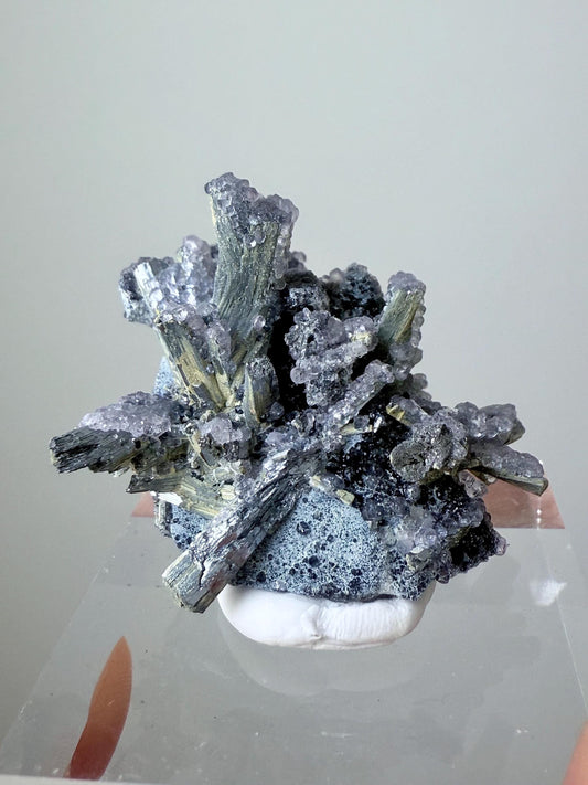 Fluorescent Fluorite-coated Stibnite & Valentinite