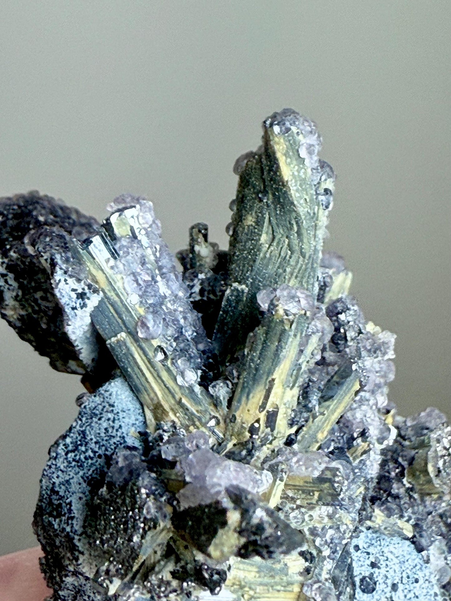 Fluorescent Fluorite-coated Stibnite & Valentinite