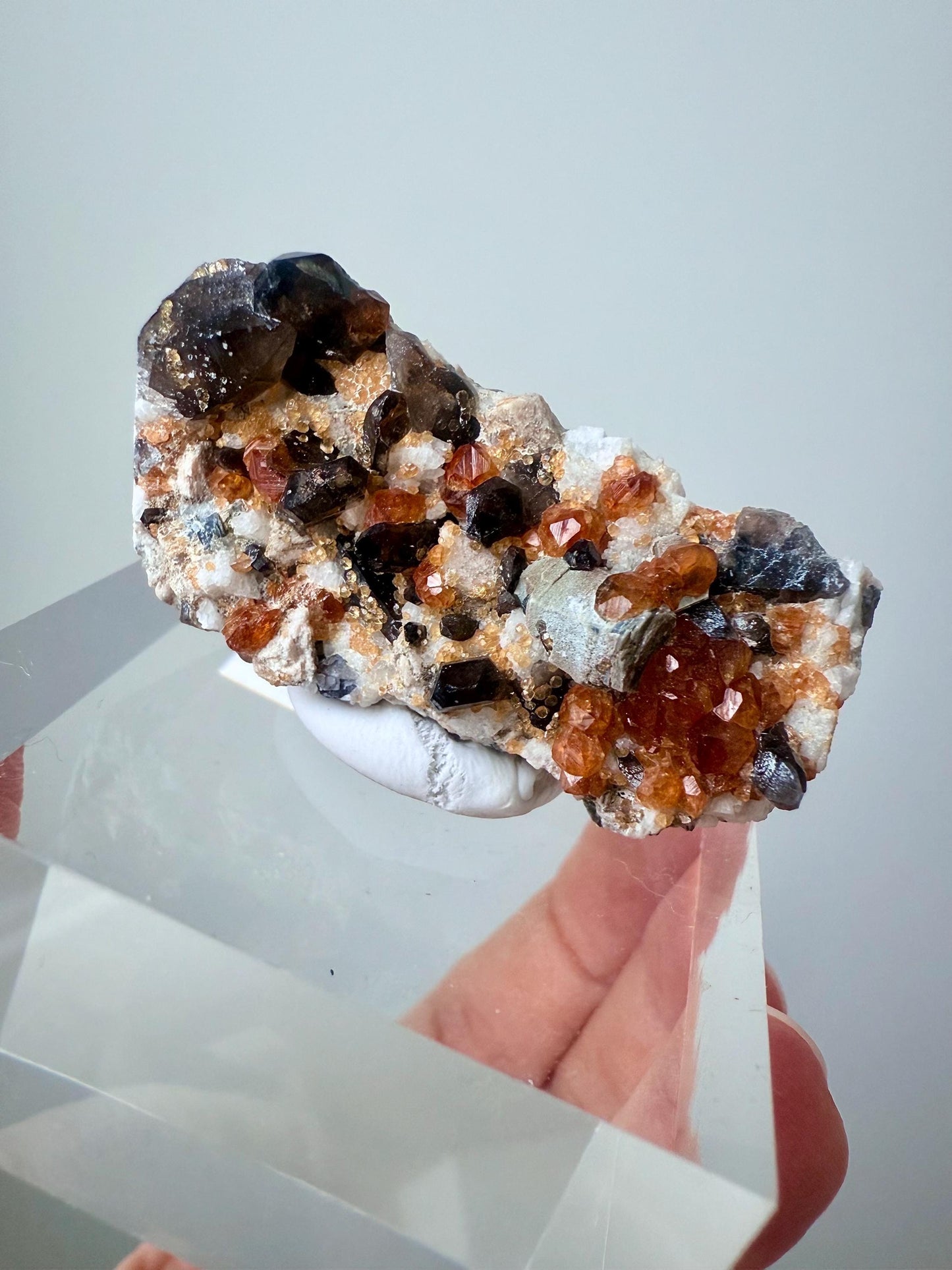 Smoky Quartz with Fanta Spessartine Garnets on Feldspar