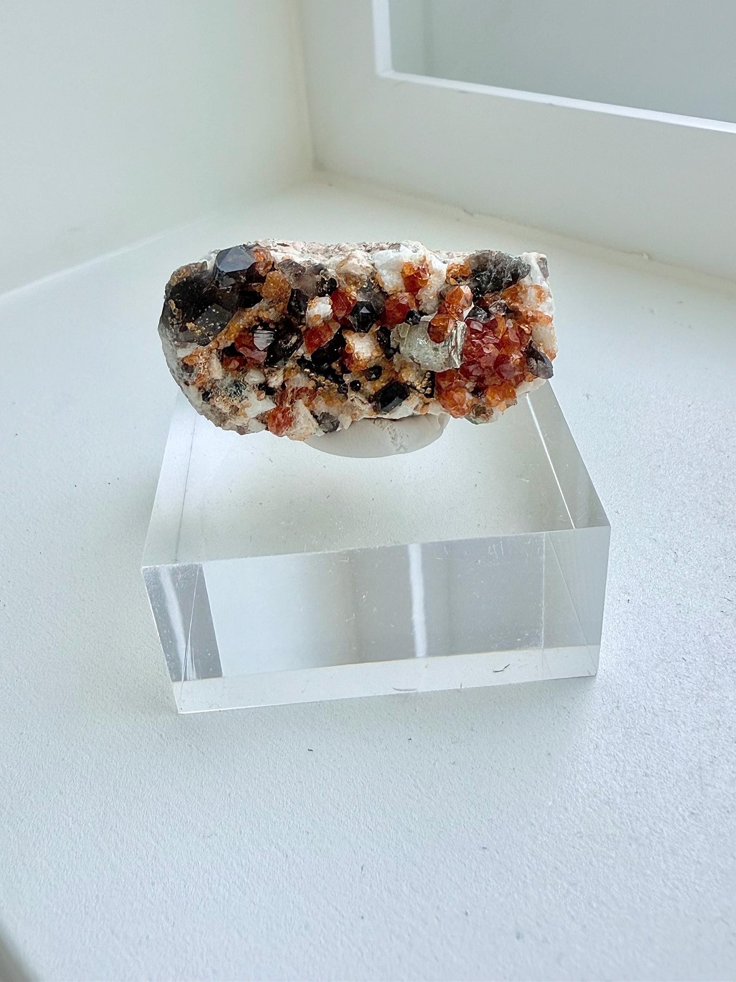 Smoky Quartz with Fanta Spessartine Garnets on Feldspar