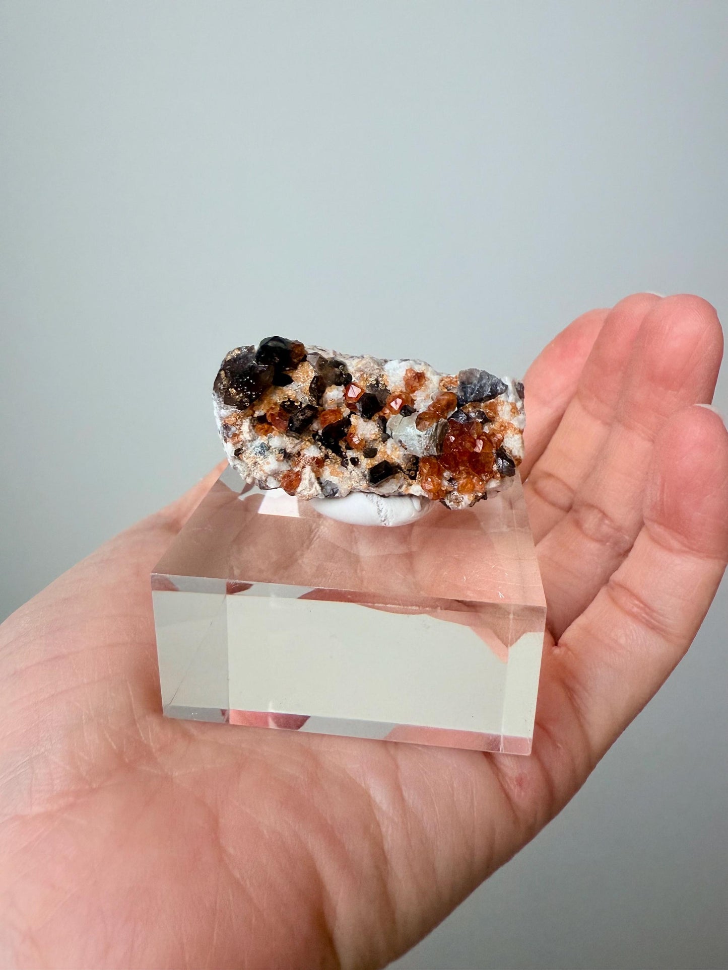Smoky Quartz with Fanta Spessartine Garnets on Feldspar