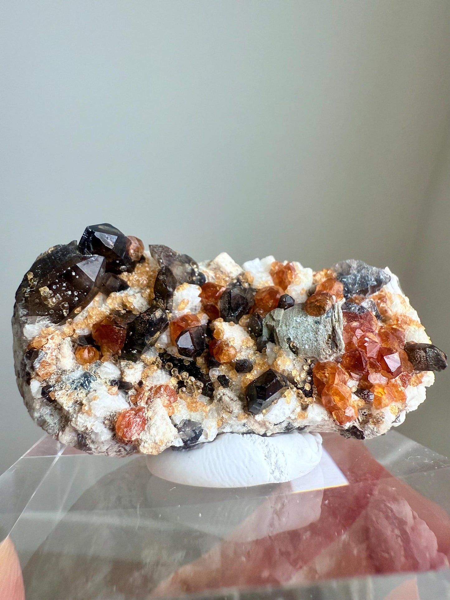 Smoky Quartz with Fanta Spessartine Garnets on Feldspar